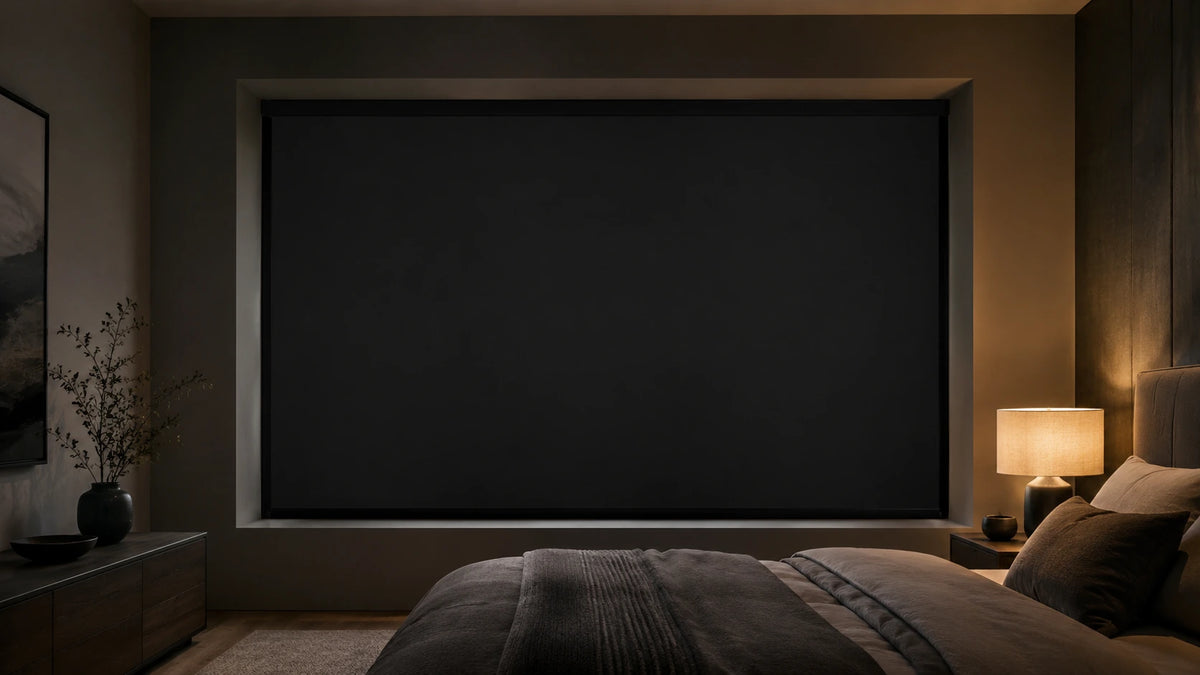 A BLOCKER blackout blind closed inside its dark perimeter system, with no light showing around the edges