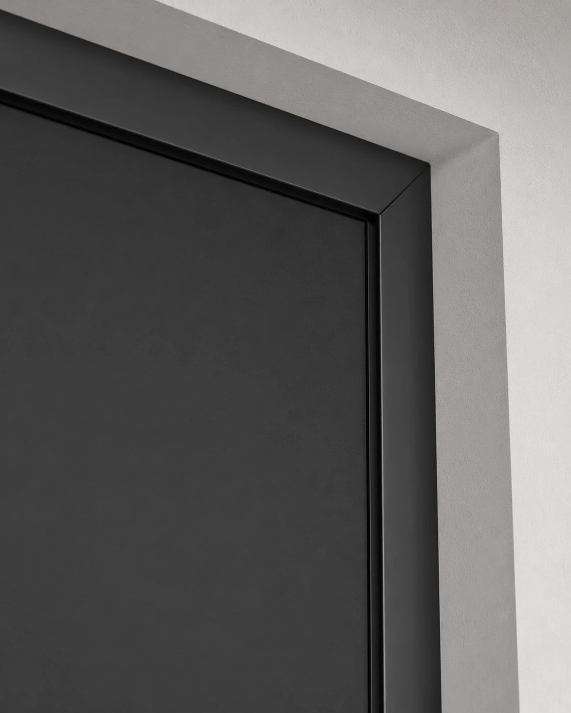 Close-up of the BLOCKER perimeter frame and side channel where the blind meets the window recess